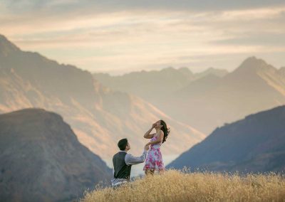 wedding proposal with mountains in background