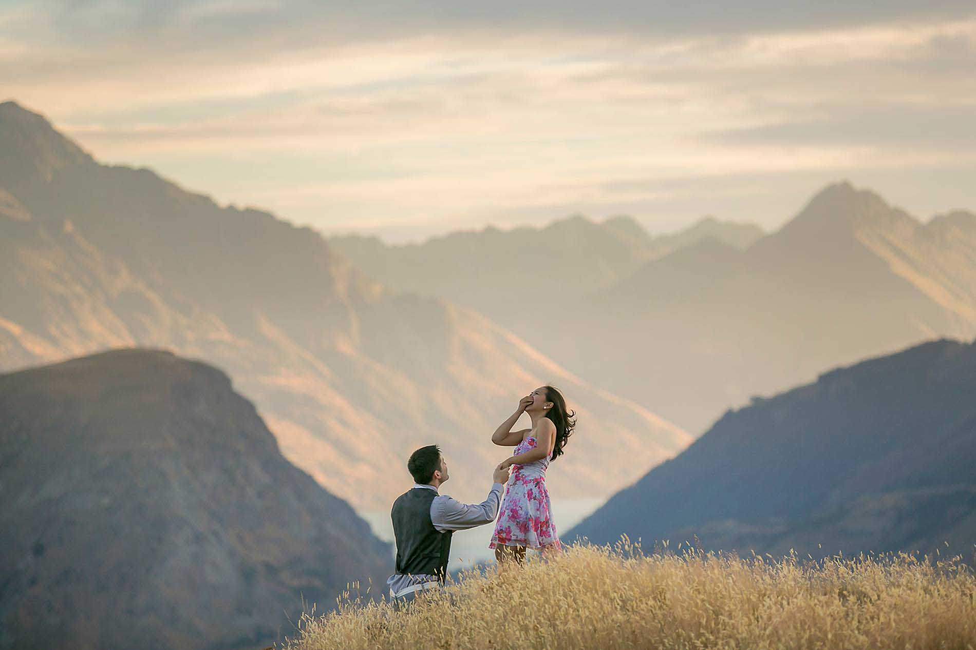 wedding proposal with mountains in background