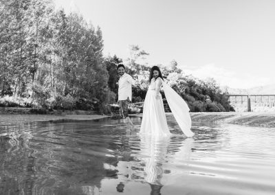 Couple playing in the water Queenstown wedding photography