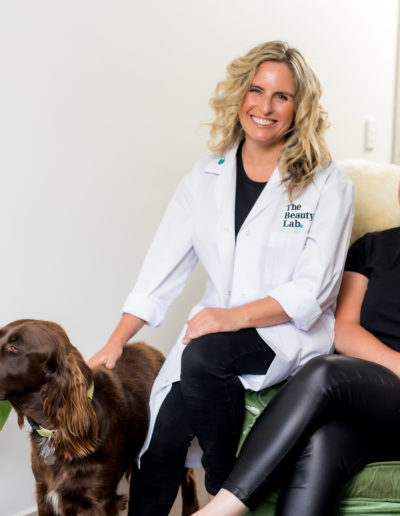 business office portrait of 2 women and dog