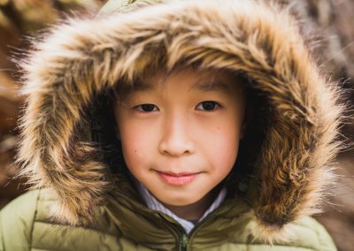 child in hooded jacket