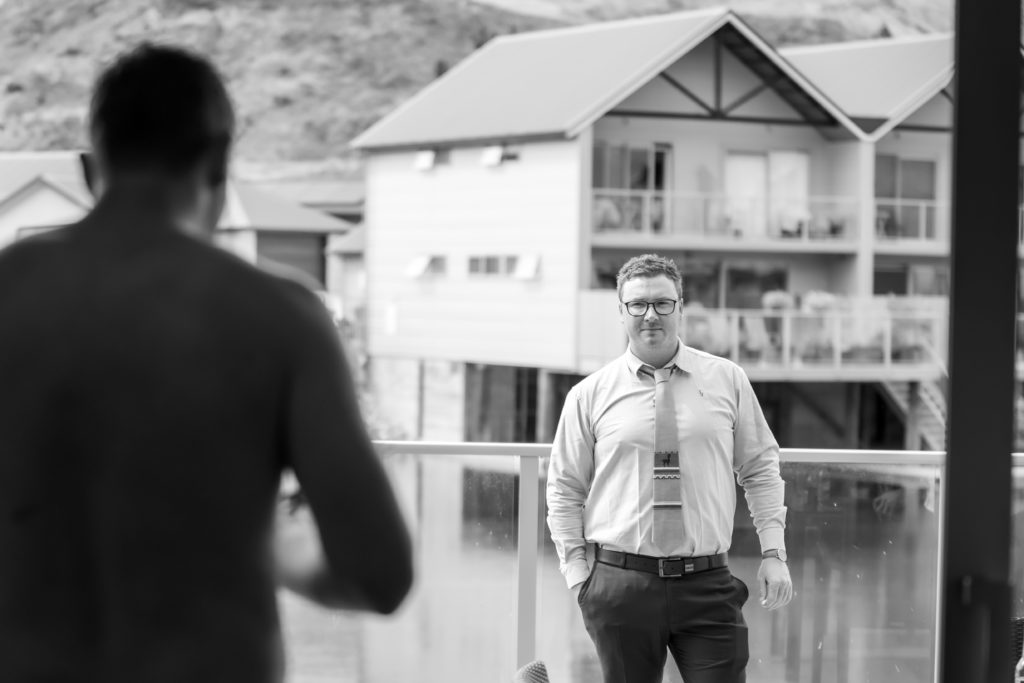 Groom's man outside in suit