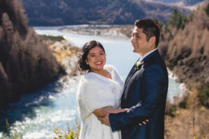 Bride and groom holding each other