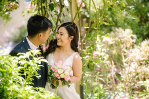 Bride and groom looking at each other