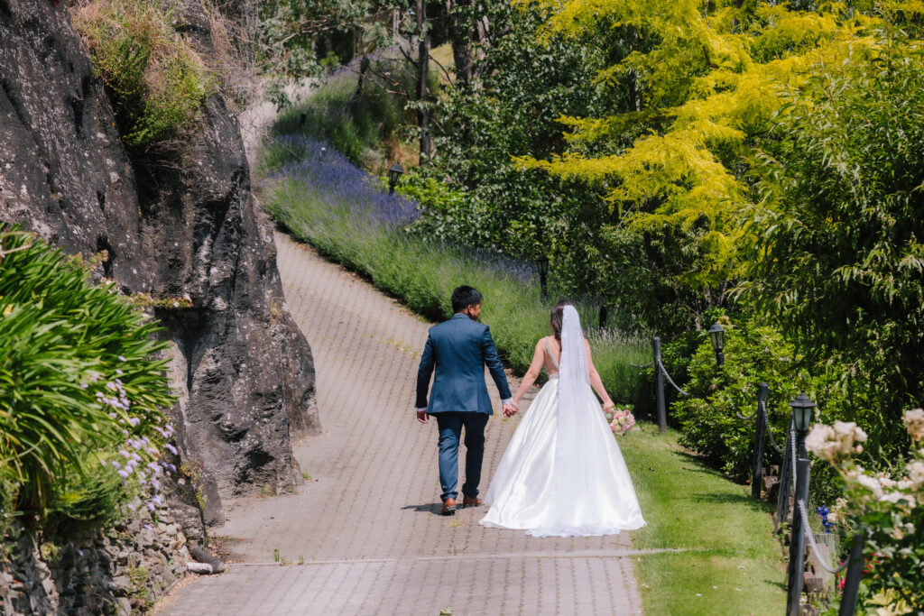 bride and groom on driveway