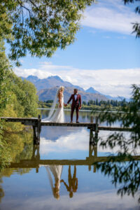 bride and groom on jetty