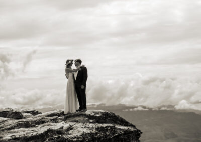 bride and groom on mountain