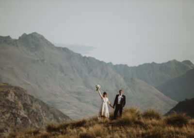 bride and groom on mountain